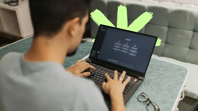 Person using a laptop with ChatGPT open, representing AI search and content strategy